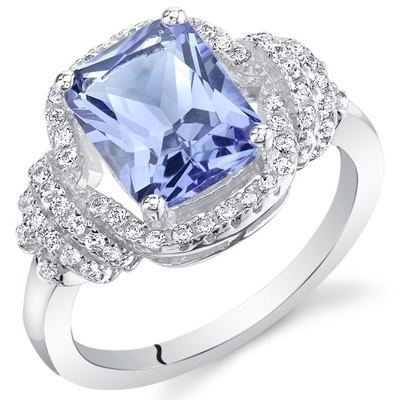 Zinke 1,25 des Karat-4 eiförmiges natürliches Tanzanite und Akzent weiße CZ Sterling Silver Ring