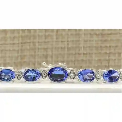 Natürliches Tanzanite weißes Topaz Link Tennis Bracelet Sterling Silber Finecraft 16 Cttw