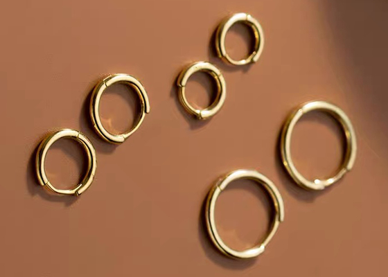 Sexy Goldband-Ohrringe ODM des Schnecken14k für Maß der Frauen-1.2mm×10mm
